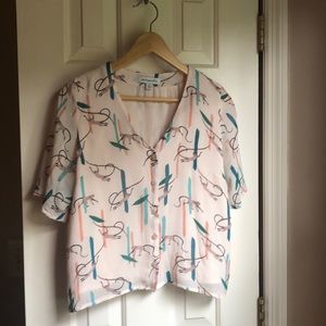 Button up blouse with swinging monkey motif